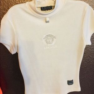 Ladies/Youth white color, size medium Vercase top.